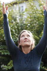 woman in yoga pose during photo session in pacifica with holman photography