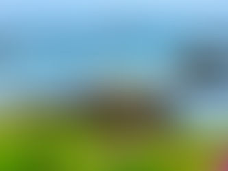 dramatic california coast with pink iceplants, roiling water and cragged rocks