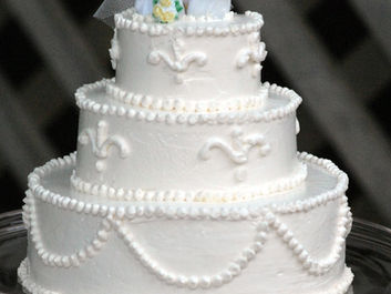 same sex wedding cake and topper