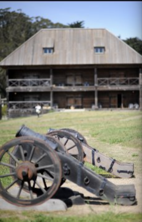 Historic buildings, chapel, cannons, and exhibits at Fort Ross State Historic Park.