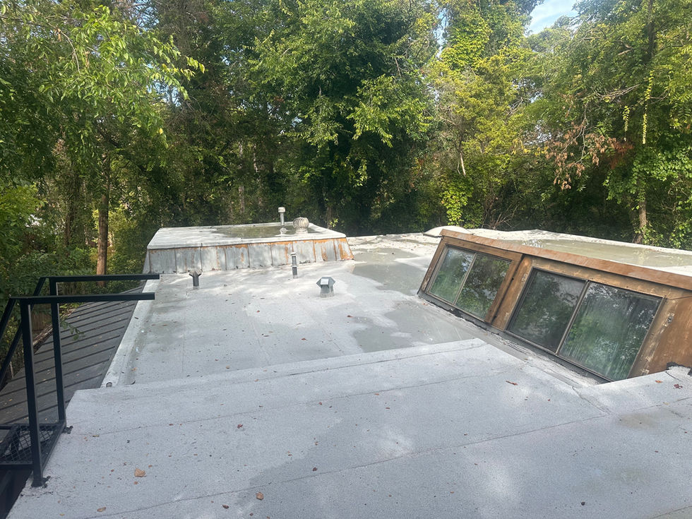 Before and after pictures of the flat torched roof.