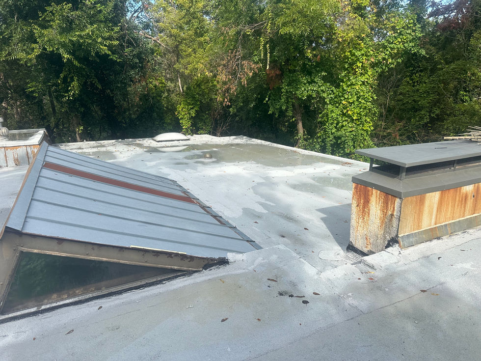 Before and after pictures of the flat torched roof.