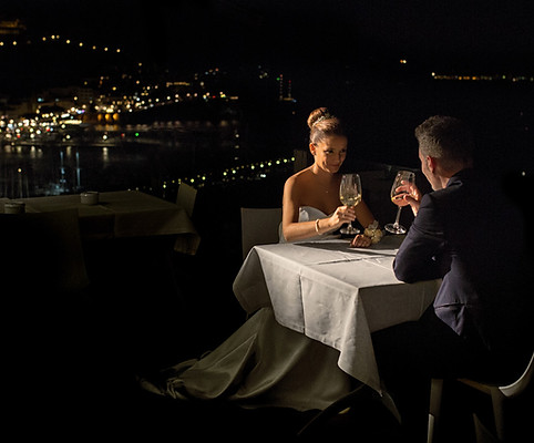 Amalfi view and newlyweds drinking