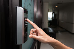 bigstock-Fingerprint-And-Access-Control-117573032