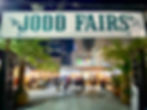 "Immerse yourself in the bustling energy of Jodd Fairs Night Market, Bangkok's go-to evening destination. Here, under the welcoming sign, locals and travelers alike mingle in a festive atmosphere, exploring an eclectic mix of food, fashion, and live entertainment.