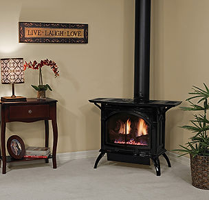 Steel Spirit gas stove with sleek design, ceramic burner, and hand-painted logs for realistic flames and efficient heating.