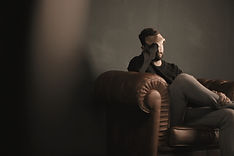 Thinking Man on Couch_edited.jpg