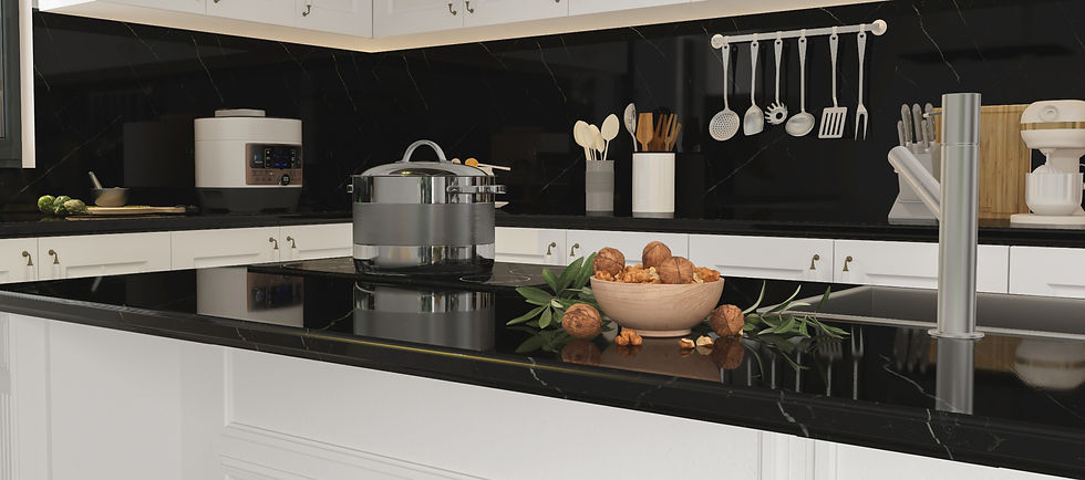 side-view-of-black-marble-island-in-luxury-kitchen-and-cracked-walnuts-in-wooden-dish-some