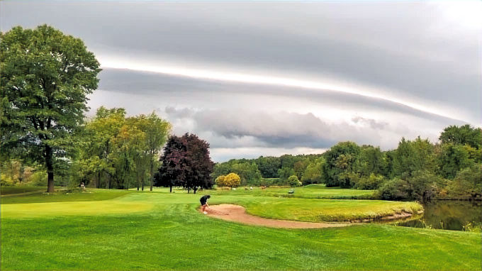 Golf course view at Chemung Hills Golf Club in Howell, MI on a sunny day