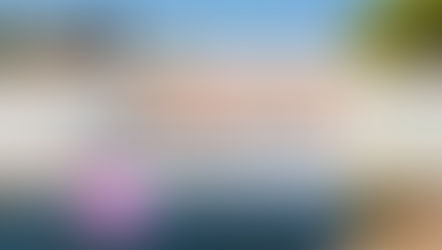 Brighton Mill Pond in downtown Brighton, MI with scenic waterfront views and walking path - thumbnail