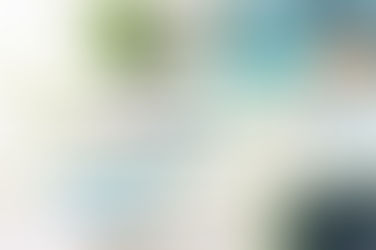 Close-up of a renter using cleaning gloves and a rag to wipe down a kitchen counter — part of quick apartment cleaning hacks for a spotless home - thumbnail