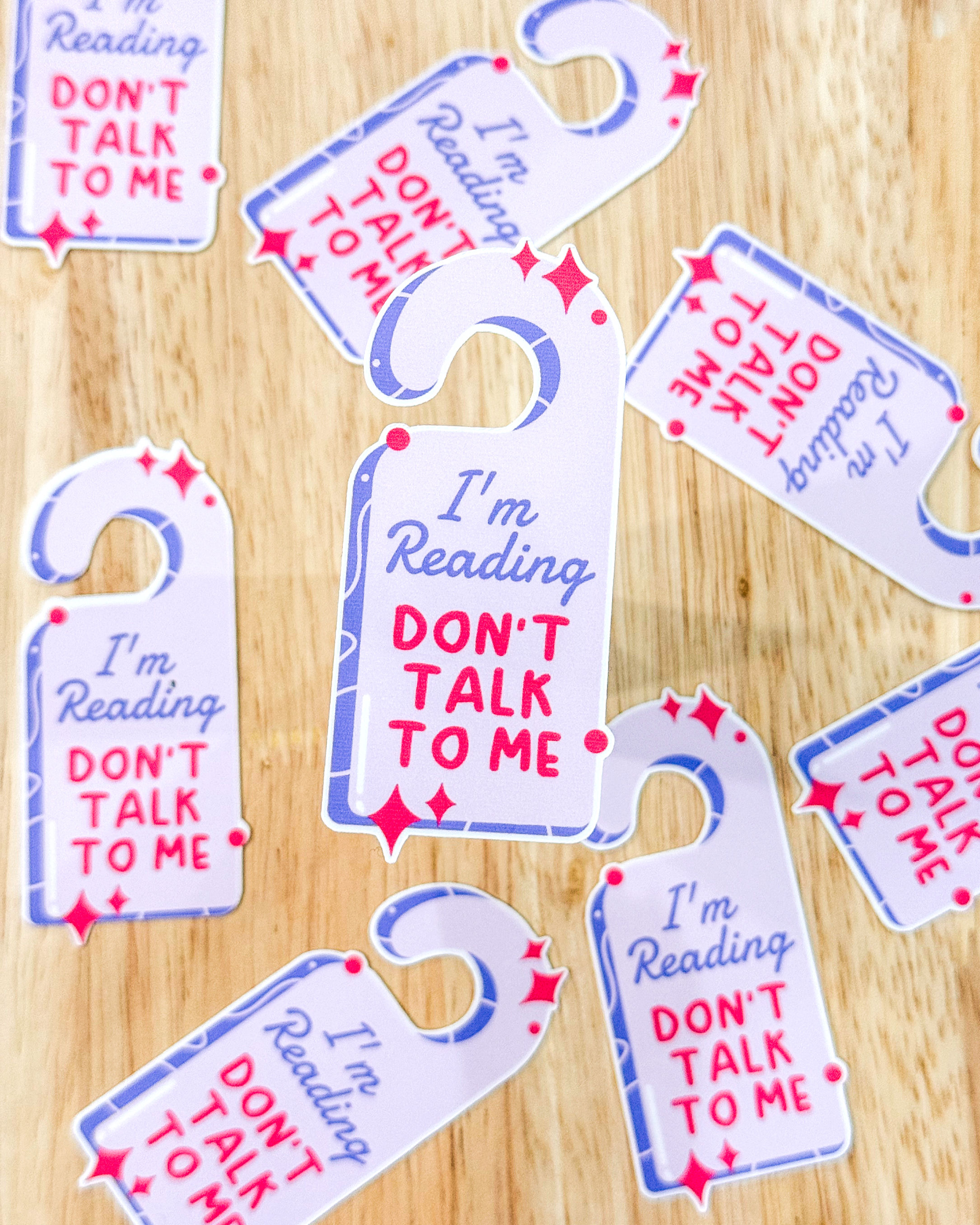 sticker that is shaped like door hanger and says I'm reading, don't talk to me by the steamy chapter