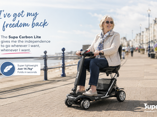 Sandra on the carbon lte folding mobility scooter that gave her her freedom back