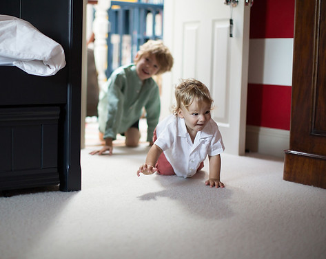 brothers-playing-chase-with-eachother-in