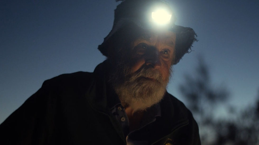 André Donadio cinematography — elderly man with white beard close-up, film still, Adelaide South Aus