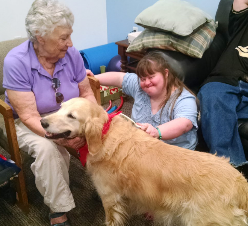 Tarese, Donna Morelli from Intermountain Therapy Dogs, and a very sweet golden named Abbie