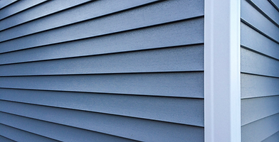 blue siding corner white trim.png