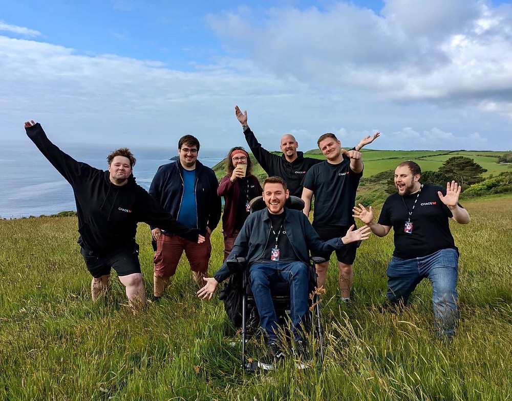 Ross and his new colleagues at CHAOS TV on the cliffs - blue skies and sea views