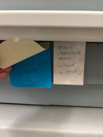 Colored Post-It notes denote box contents and when items were last checked.