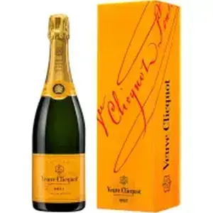 Veuve Clicquot Brut – шампанское в желтой бутылке, отражающее элегантность и праздничное настроение.