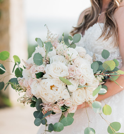 Luxury bridal bouquet with pink, white, and green spring florals at a romantic Vintage Villas wedding