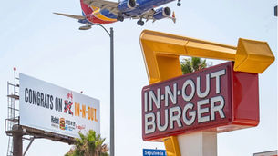 billboards of Habit Burger and In-N-Out burger
