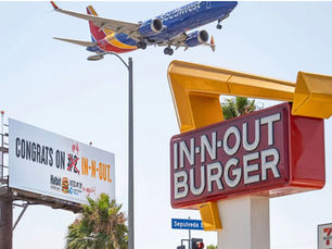 billboards of Habit Burger and In-N-Out burger