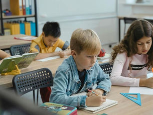 kids at school writing and drawing