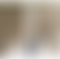 couple walking in fresh snow in the woods