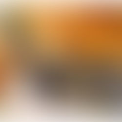 engaged couple smiling in front of the river