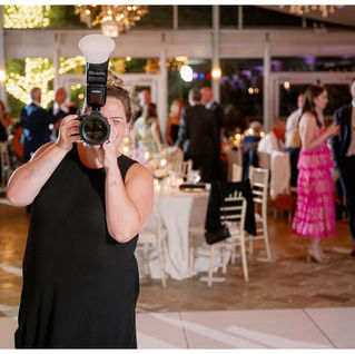 wedding photographer taking a photo
