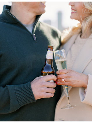 couple cheersing with drinks