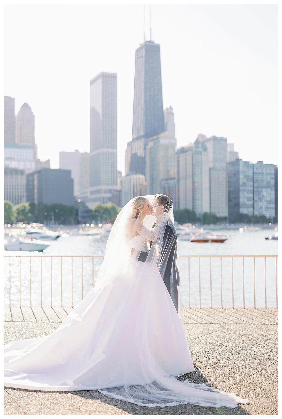 Carlie had a vision of getting this shot of her and Roger underneath her veil. The light at Olive Park was perfection and made the veil glow perfectly. After I took this shot, I ended up doing it a few more weddings because I loved the way it turned out. 