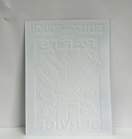 White embossed Ford Parts Service sign with Build Tough text on it.