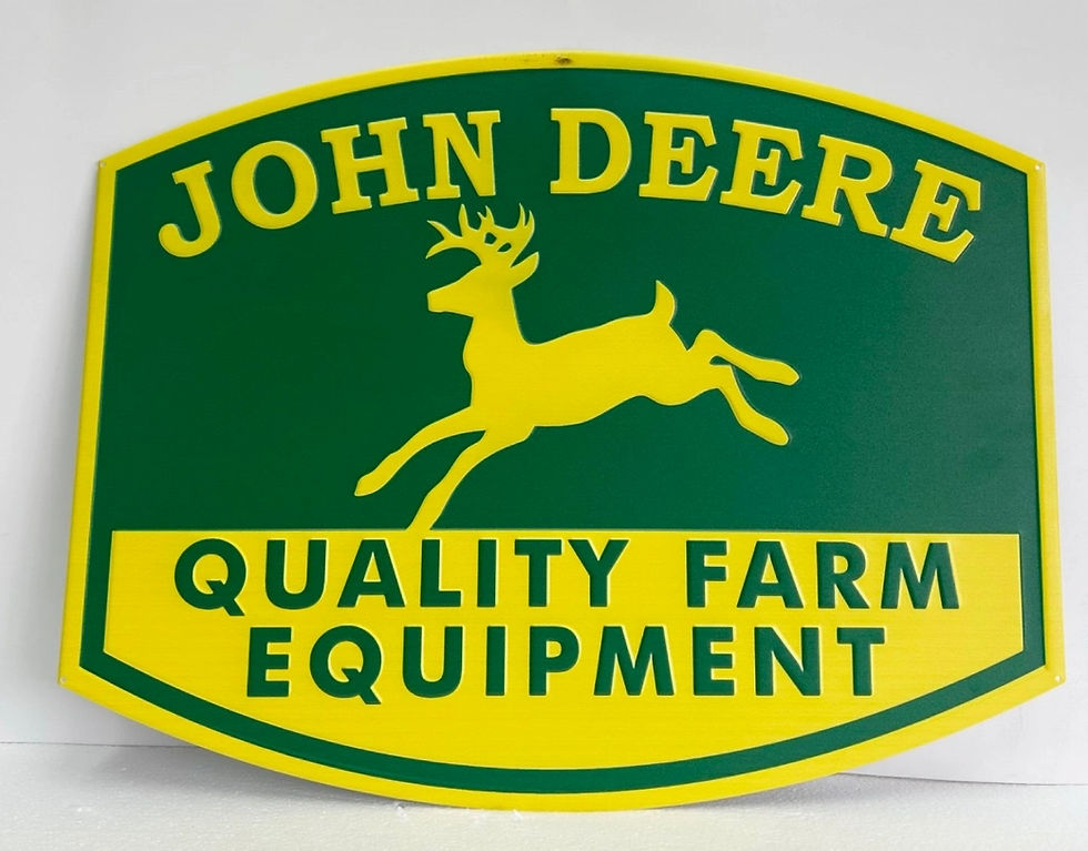 John Deere logo with deer and quality farm equipment text.
