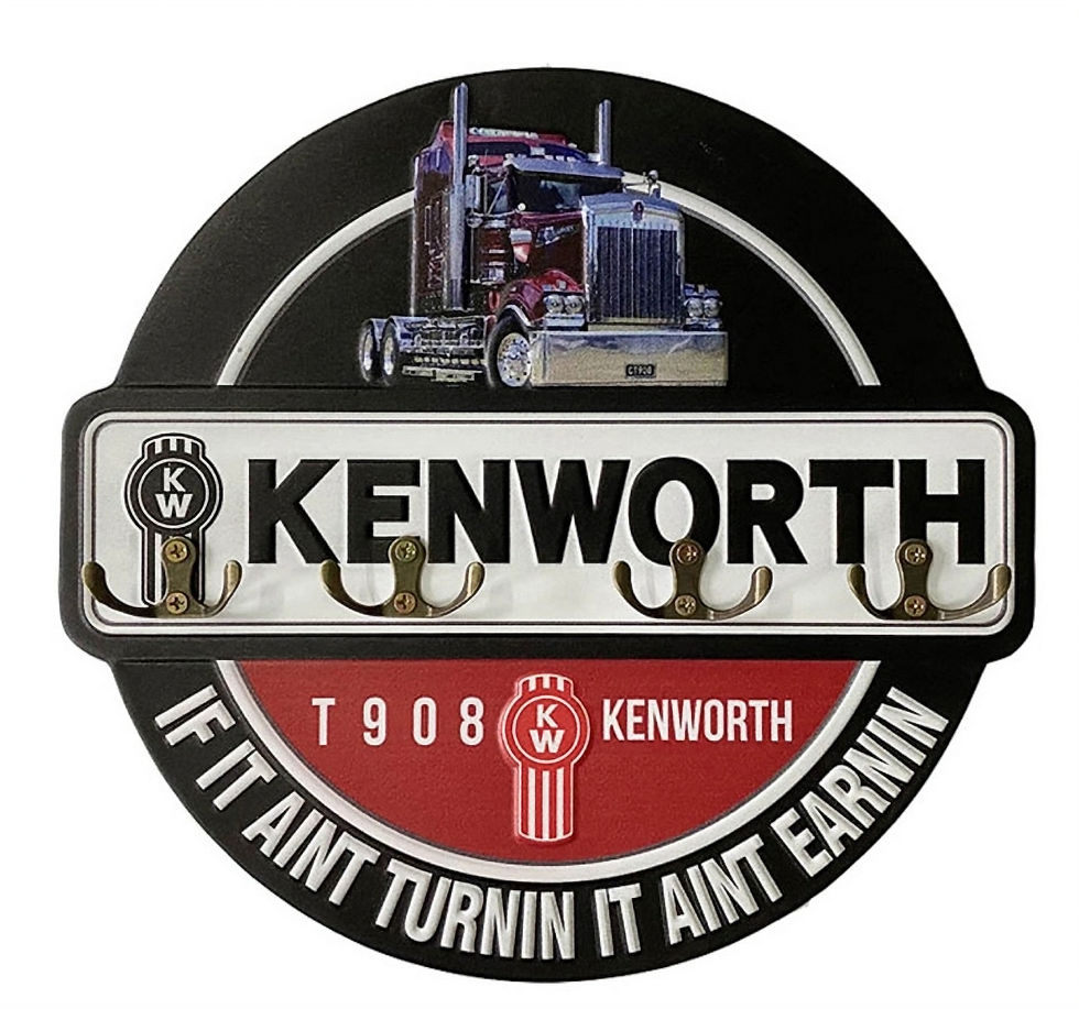 round Kenworth sign with 4 key hook on it with truck and slogan round the rim