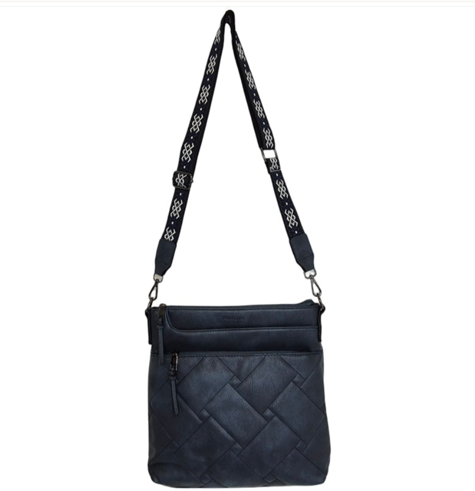 Thumbnail: Dark blue leather crossbody bag with patterned strap. Worn on display.