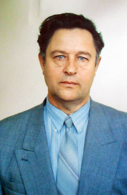 Долгин Иван Кузьмич, руководитель в сфере образования, Заслуженный учитель школы РФ