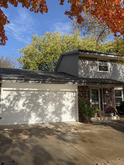 New roof and siding project by Cream City Roofing & Siding in Menomonee Falls, WI enhancing structural integrity and visual appeal