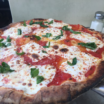 Photo of a fresh margherita pizza | Little Mozz | Wood Fired Pizza Trailer | Catering for Private Parties and Corporate Events in Westchester County, New York and Fairfield County, Connecticut