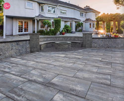 Photo of stone outdoor area next to a house | Top Rated Building Material Company in New York