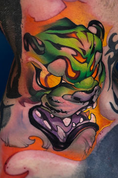 New school colorful tattoos with a green tiger face
