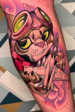 Newschool pilot cat with airplane and colorful tattoos