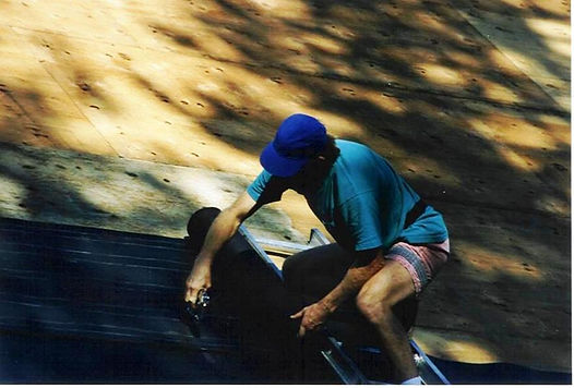 Tar paper being installed on the roof