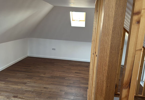 Image of finished loft conversion with bespoke joinery work