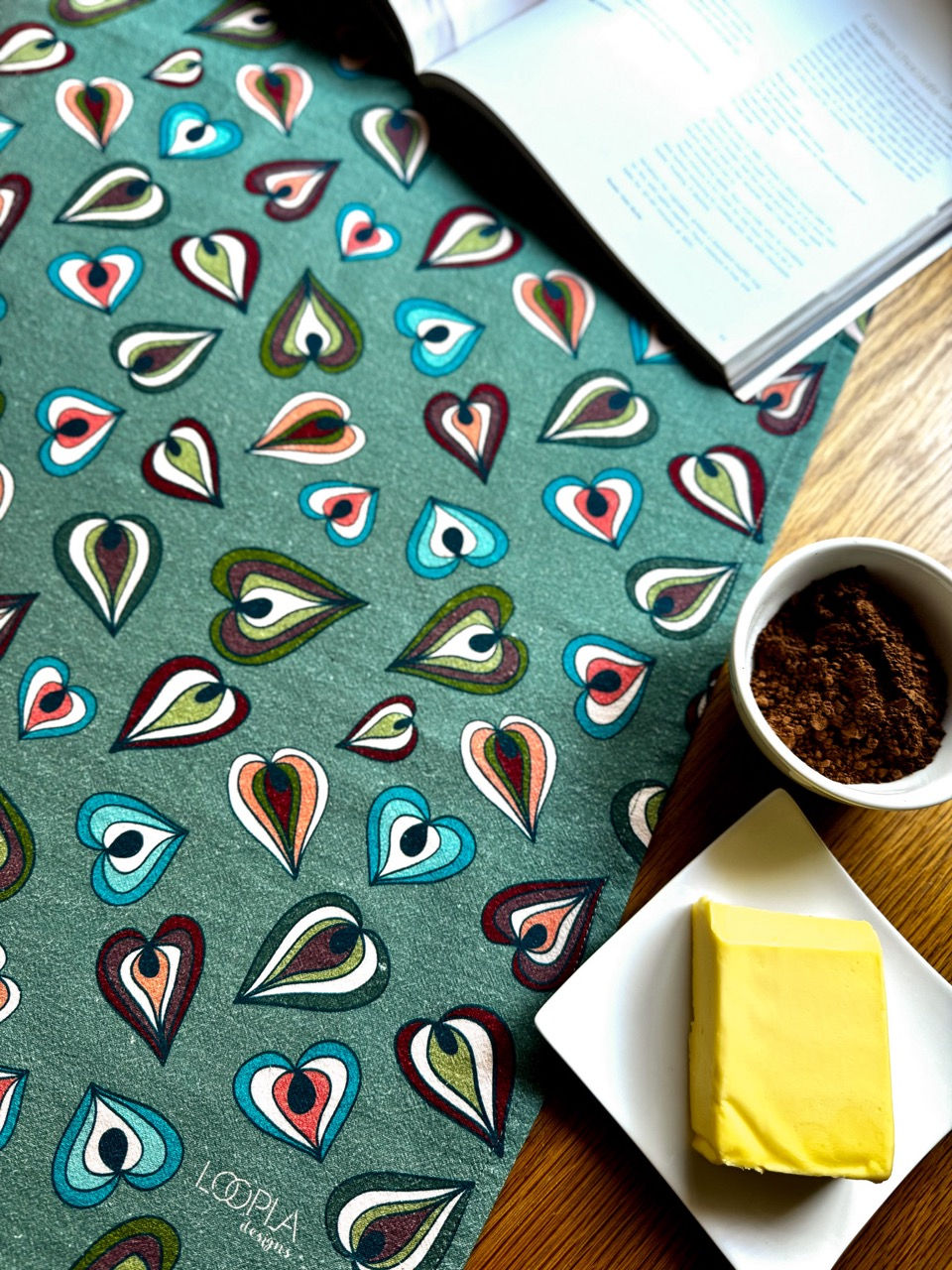 Colourful Rainbow Leaves design in greens and burgundy by Surface Pattern Designer Tammy de Zilva