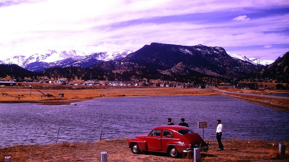 Red car similar to VW and three guys - Film processed Apr, 1963