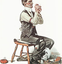 MAN THREADING A NEEDLE