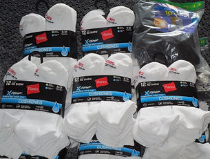 21. Hanes Socks Drive 2021 - Bounty of 222 mens socks JFK Holiday Inn shelter.JPG