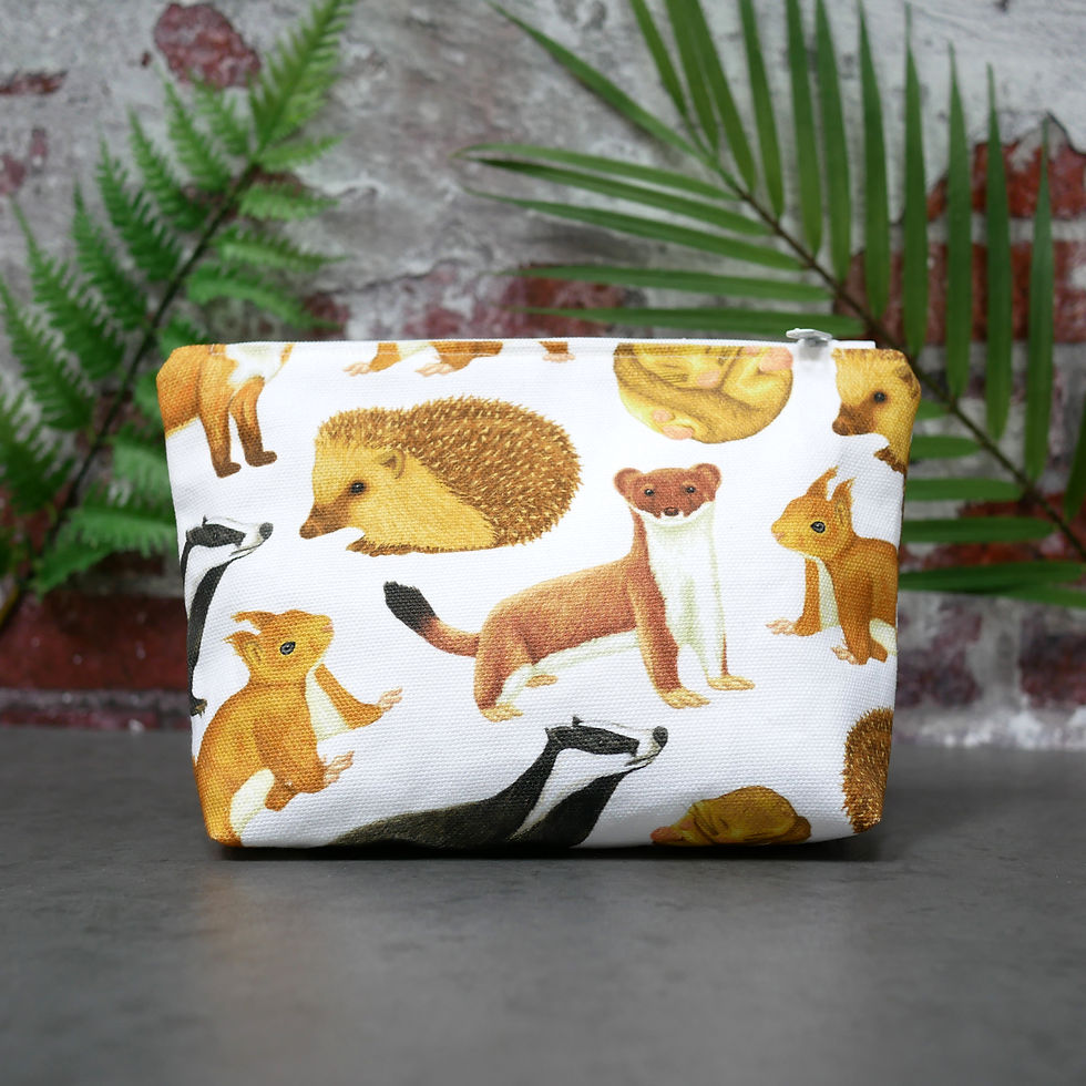Thumbnail: A washbag with illustrated British mammals all over it. Mammals include fox, dormouse, badger, stoat, red squirrel and hedgeh
